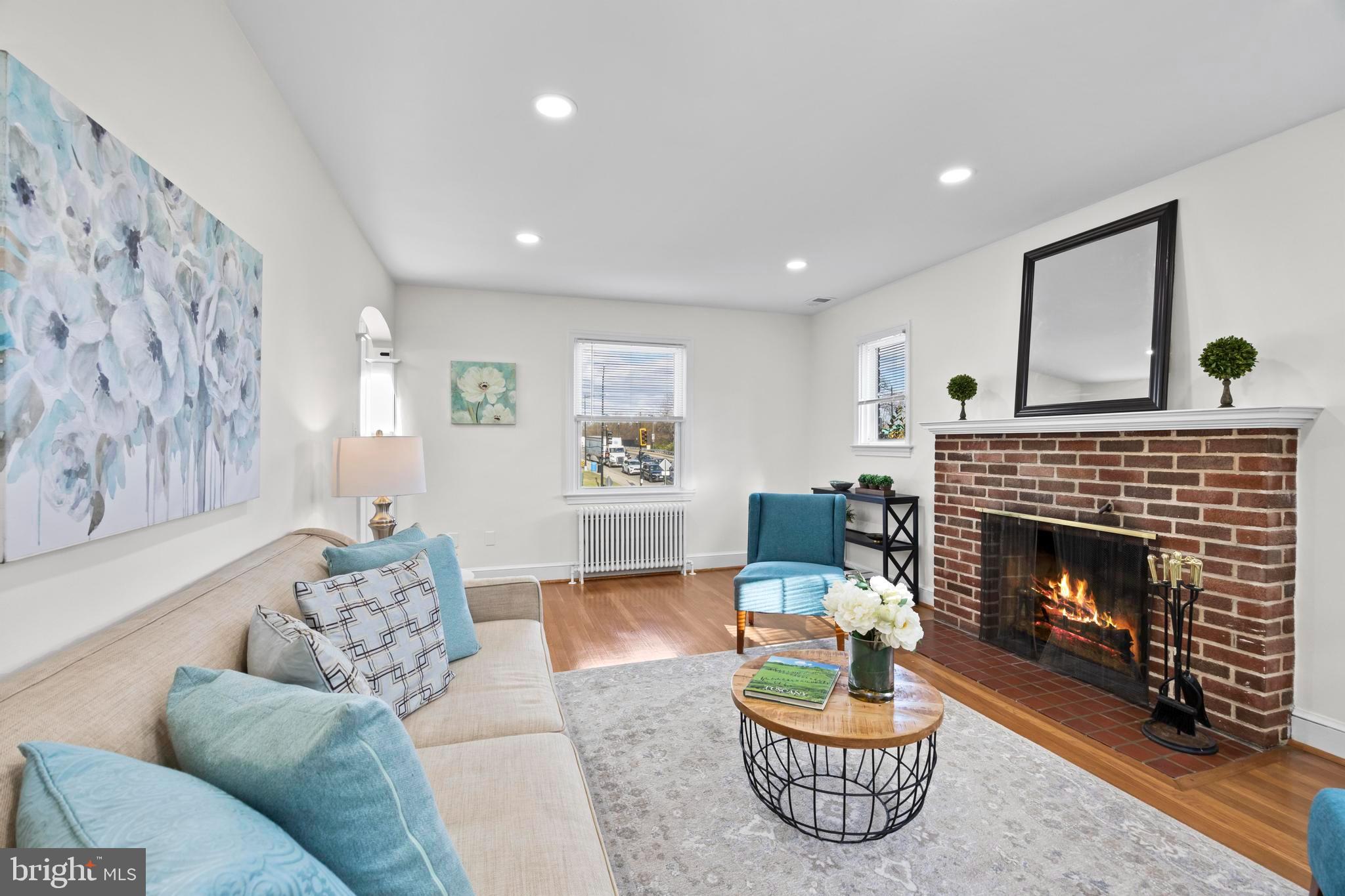 31 McDonald Place Northeast Washington, DC 20011 - Photo 5 of 45 a living room with furniture and a fireplace