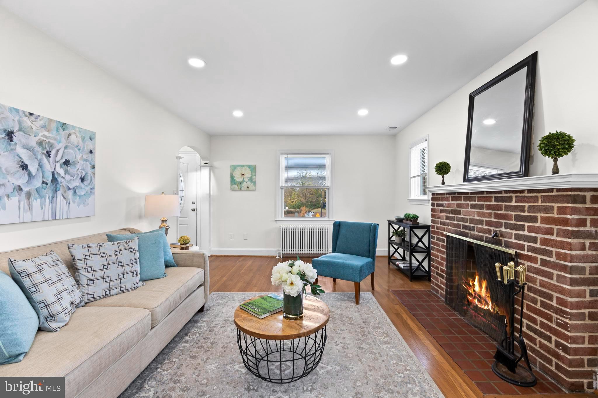 31 McDonald Place Northeast Washington, DC 20011 - Photo 6 of 45 a living room with furniture and a fireplace