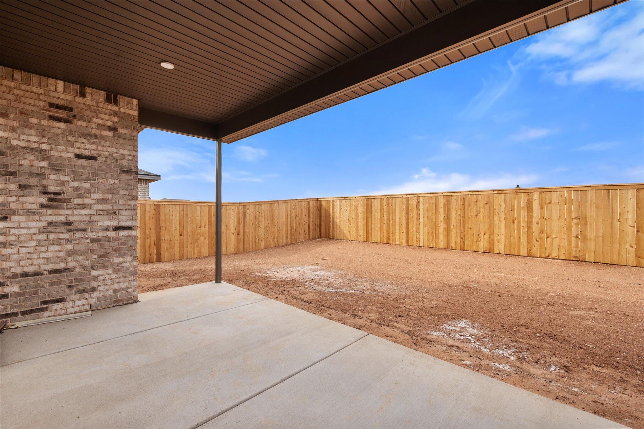 2901 Tractor Avenue Wolfforth, TX 79382 - Photo 24 of 25 a view of a backyard