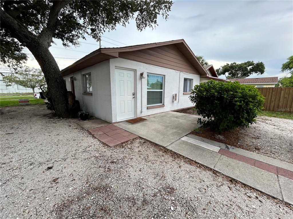530 5th Avenue West, Unit C Palmetto, FL 34221 - Photo 2 of 27 front view of a house with a yard