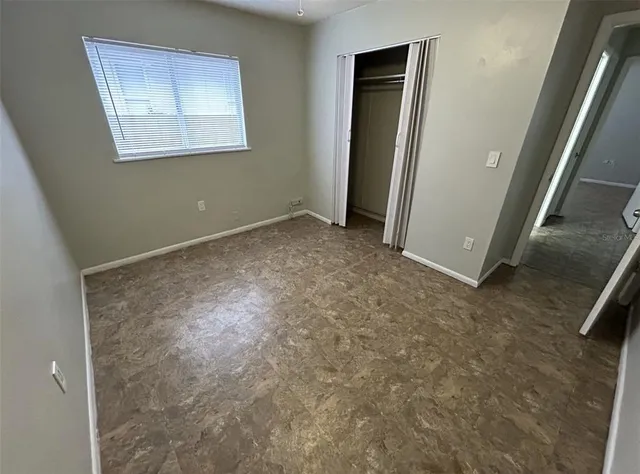 an empty room with windows