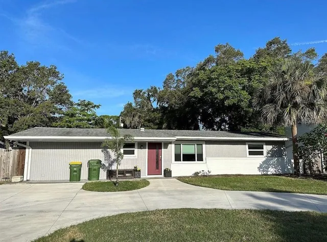 front view of a house with a patio