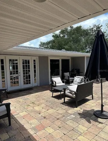 a building outdoor space with patio furniture