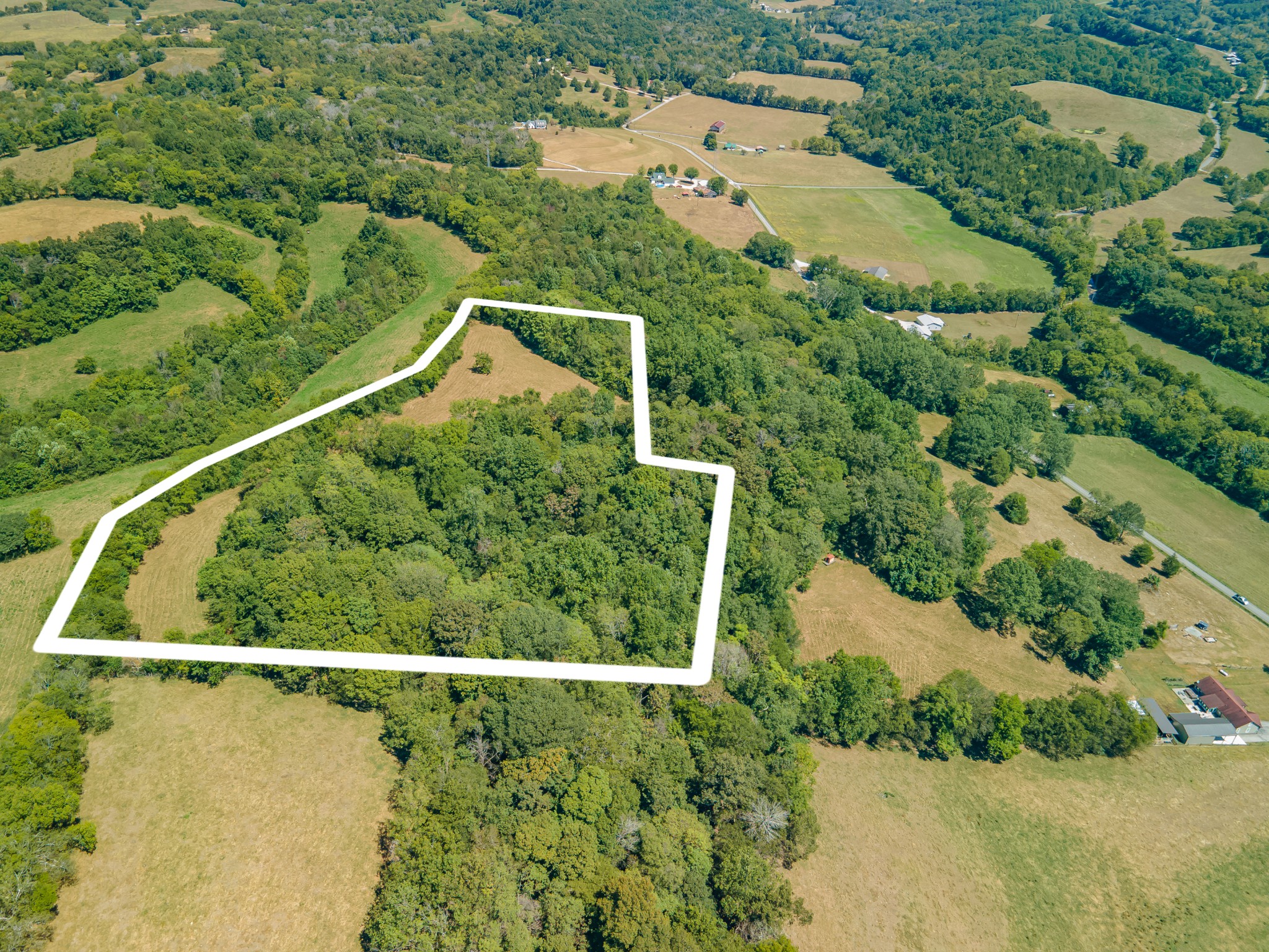4283 Turkey Creek Road Williamsport, TN 38487 - Photo 11 of 13 an aerial view of a house with a yard and lake view