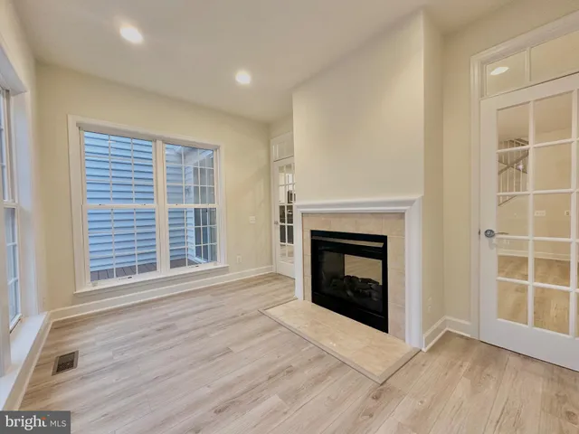 a view of a hallway with staircase