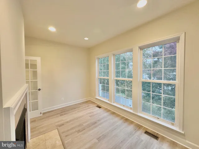 a view of a hallway with washer and dryer