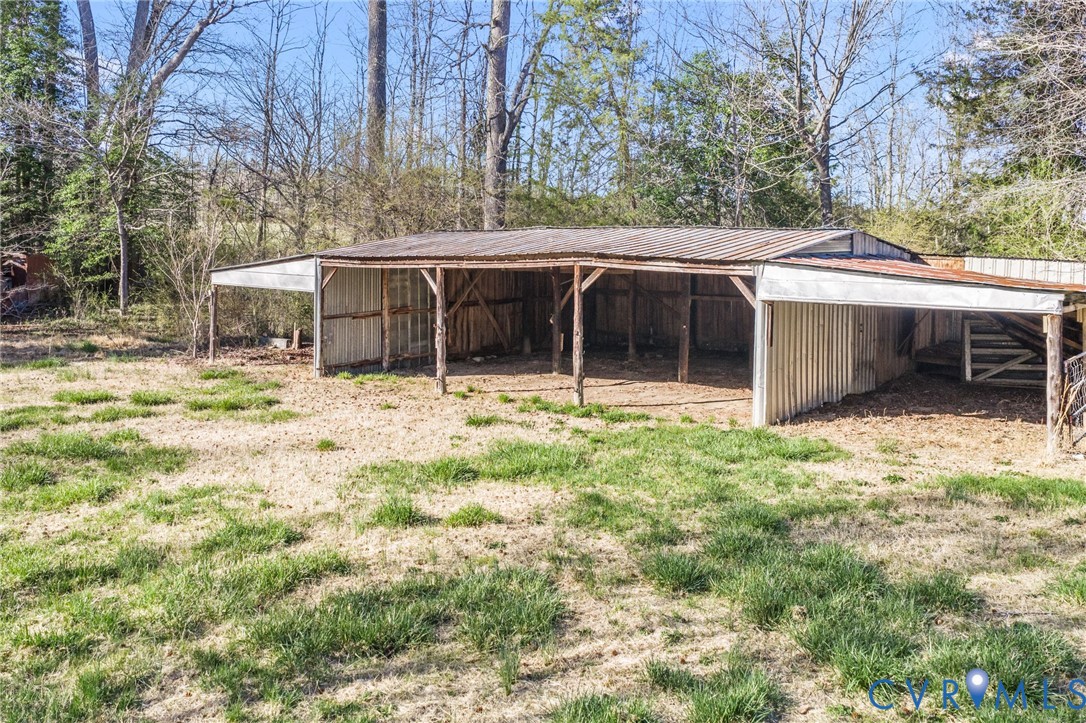 19161 Hollowing Creek Road Beaverdam, VA 23015 - Photo 10 of 27 a house with trees in the background