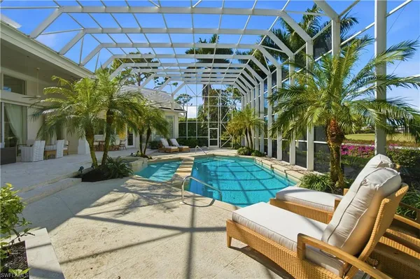 a view of a backyard with a patio