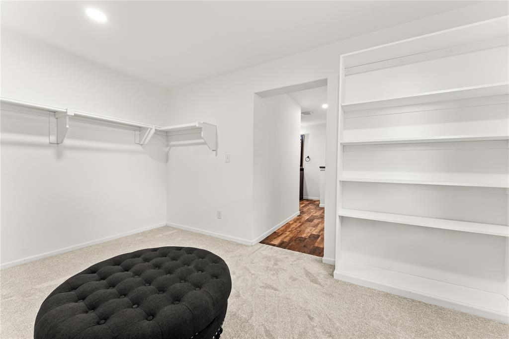 1265 North Houston Street Lorena, TX 76655 - Photo 16 of 29 a view of room with an empty room and shelf
