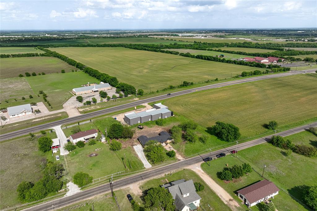 1265 North Houston Street Lorena, TX 76655 - Photo 28 of 29 an aerial view of a city with a lake view