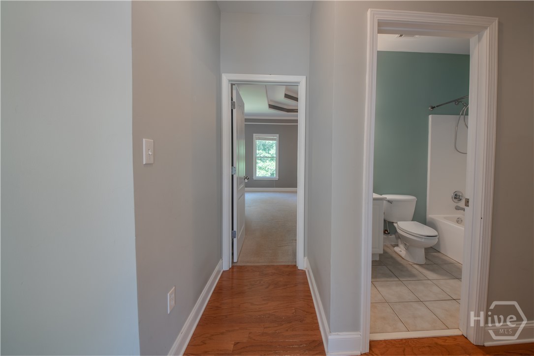 217 Hidden Spring Way Athens, GA 30605 - Photo 16 of 55 Hallway to Primary Suite, Hall Bath and Additiona Bedrooms
