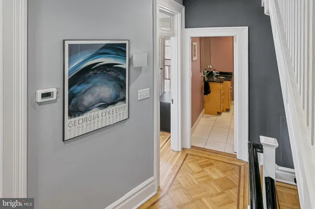 a view of a bedroom from a hallway