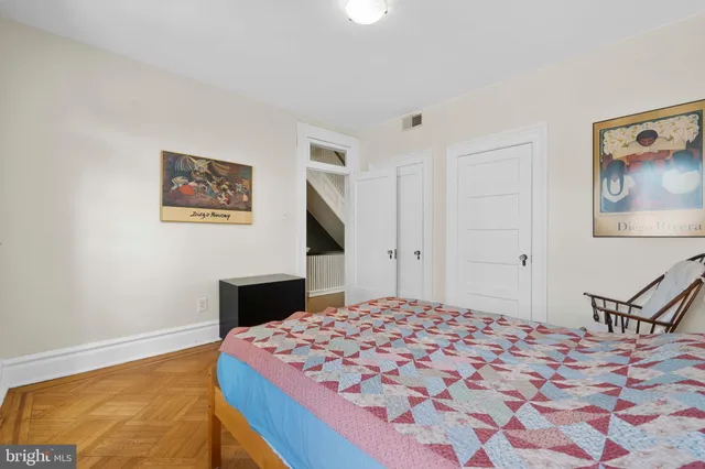 a workspace with furniture and wooden floor