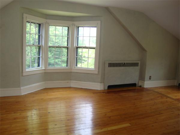 14 Howland Road Freetown, MA 02702 - Photo 18 of 21 a view of an empty room with wooden floor and a window