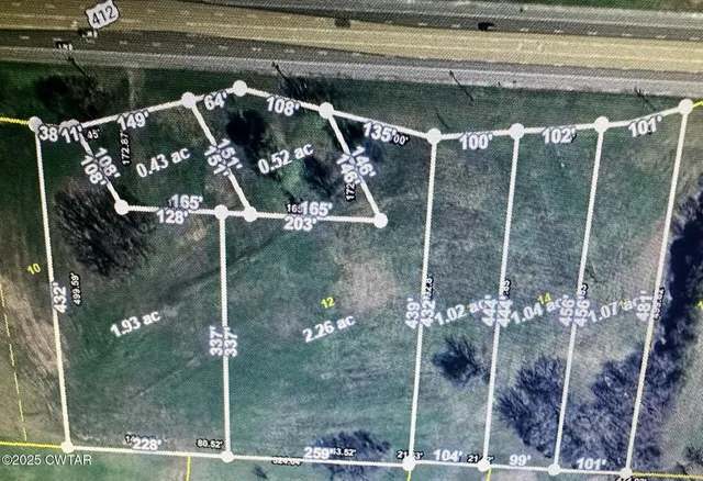 a picture of a bathroom with a shower