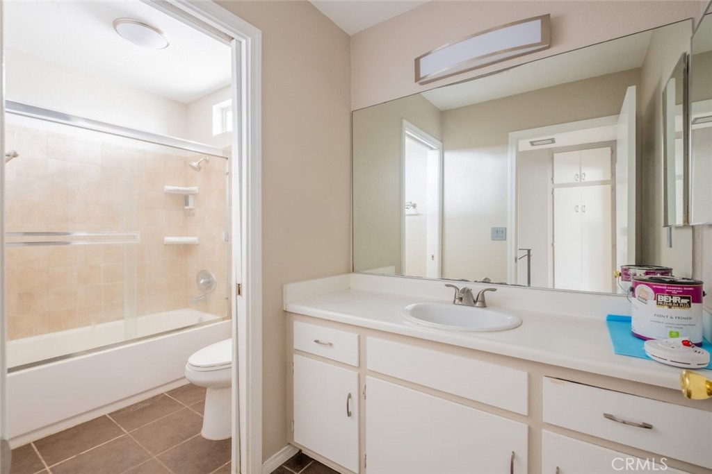 1341 North Keystone Street, Unit E Burbank, CA 91506 - Photo 11 of 16 a bathroom with a sink a toilet and shower