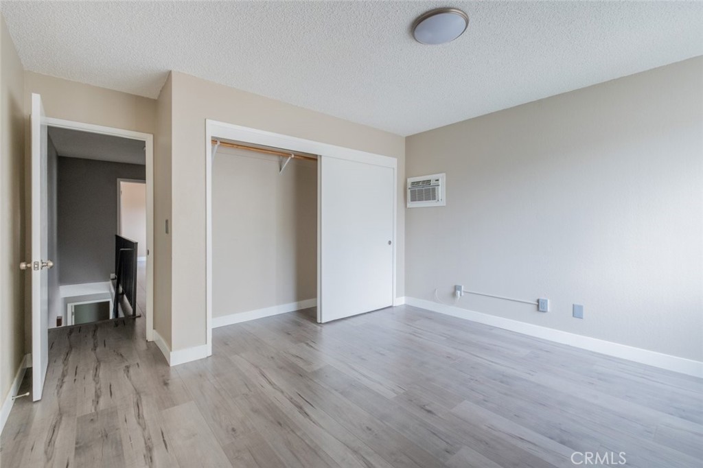 1341 North Keystone Street, Unit E Burbank, CA 91506 - Photo 13 of 16 wooden floor in an empty room