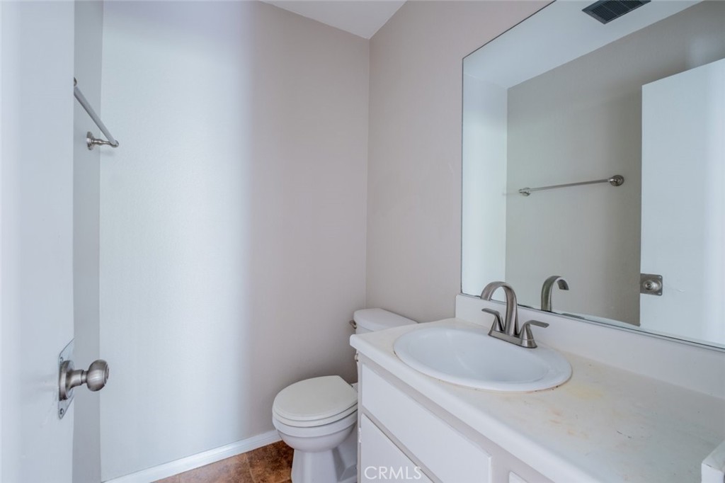 1341 North Keystone Street, Unit E Burbank, CA 91506 - Photo 7 of 16 a bathroom with a sink and a toilet