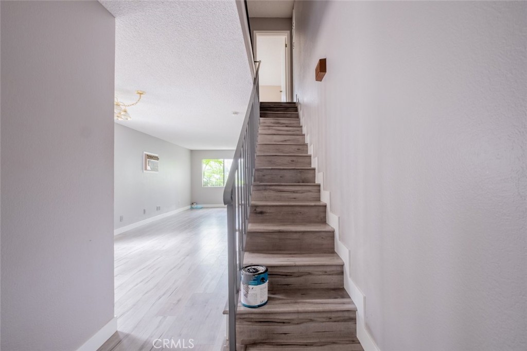1341 North Keystone Street, Unit E Burbank, CA 91506 - Photo 8 of 16 a view of entryway and hall with wooden floor