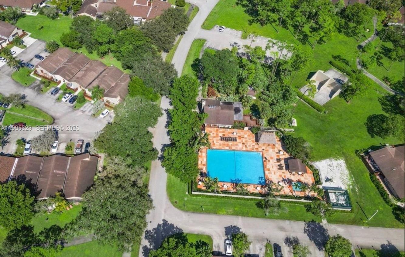 22278 Misty Woods Way, Unit 22278 Boca Raton, FL 33428 - Photo 17 of 20 an aerial view of a house with a garden