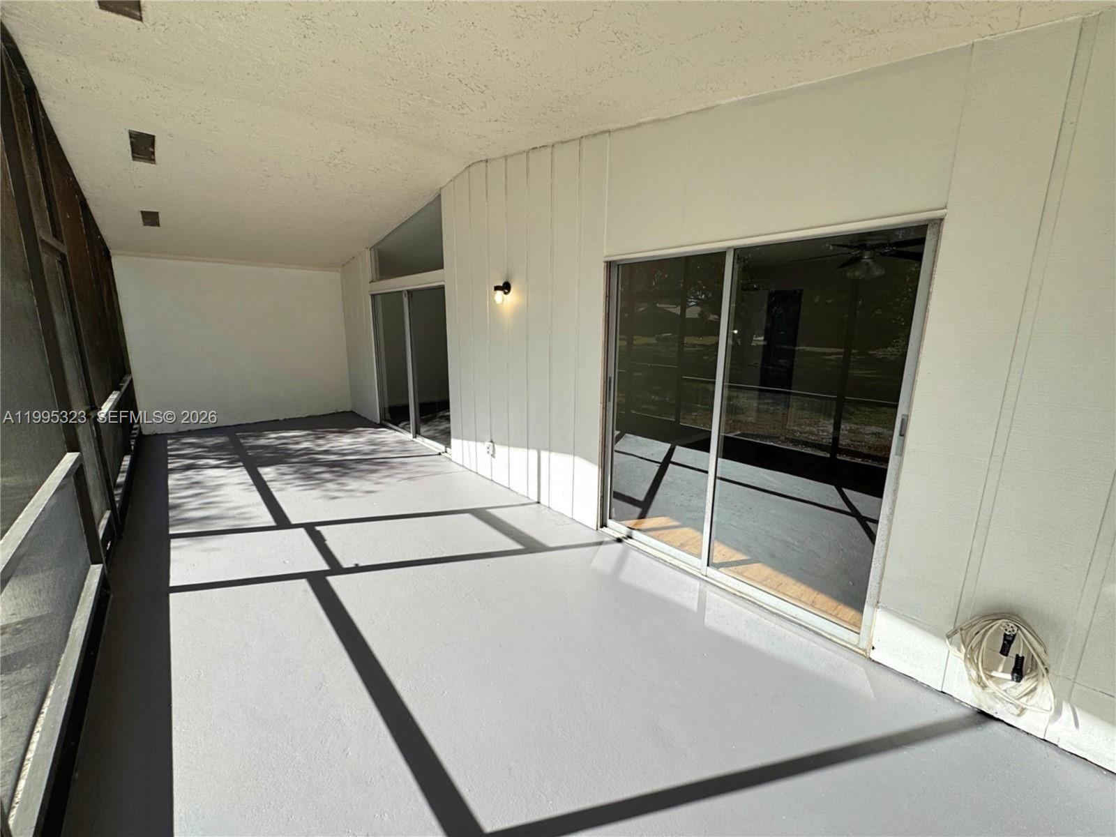 22278 Misty Woods Way, Unit 22278 Boca Raton, FL 33428 - Photo 5 of 20 view of kitchen with sink and refrigerator