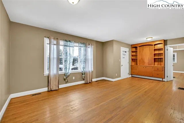 a kitchen with a sink and a window