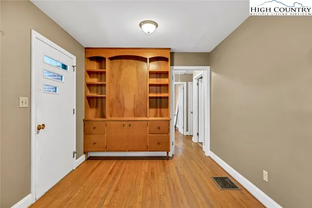 a kitchen with stainless steel appliances granite countertop a sink and cabinets