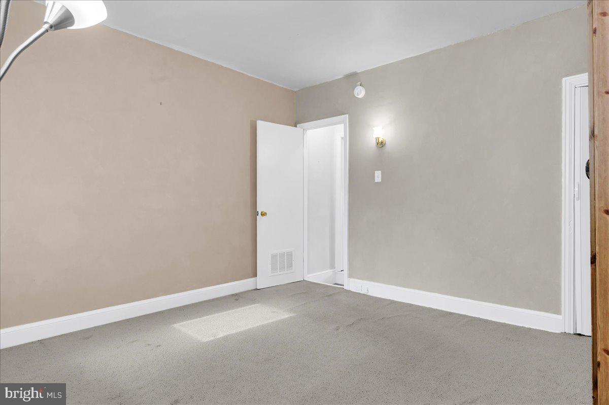 215 8th Street Brookhaven, PA 19015 - Photo 16 of 29 an empty room with an entryway