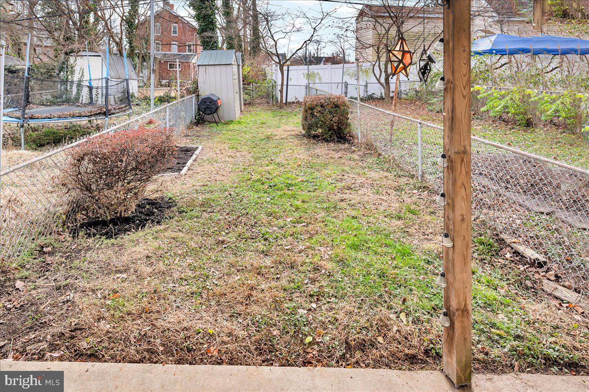 215 8th Street Brookhaven, PA 19015 - Photo 20 of 29 a backyard of a house with lots of green space