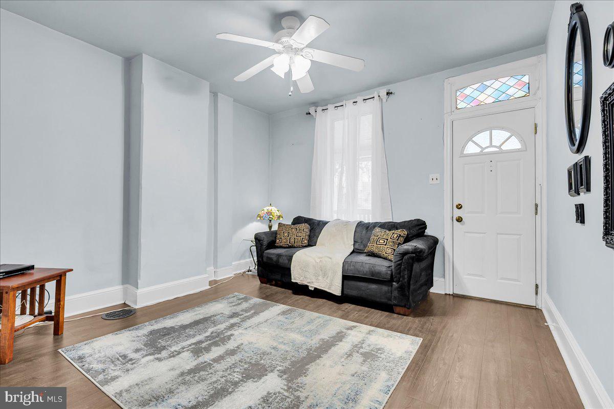 215 8th Street Brookhaven, PA 19015 - Photo 7 of 29 a living room with furniture and a rug