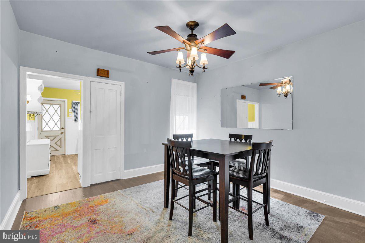 215 8th Street Brookhaven, PA 19015 - Photo 8 of 29 a view of a dining room with furniture and chandelier