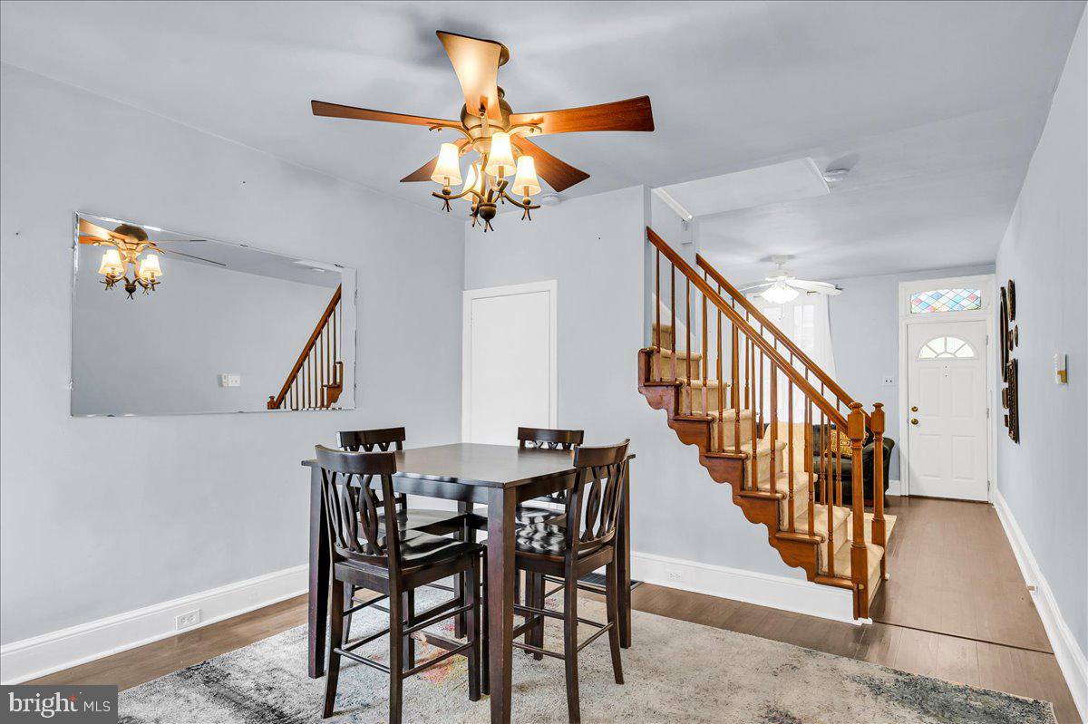 215 8th Street Brookhaven, PA 19015 - Photo 9 of 29 a view of a dining room with furniture and wooden floor