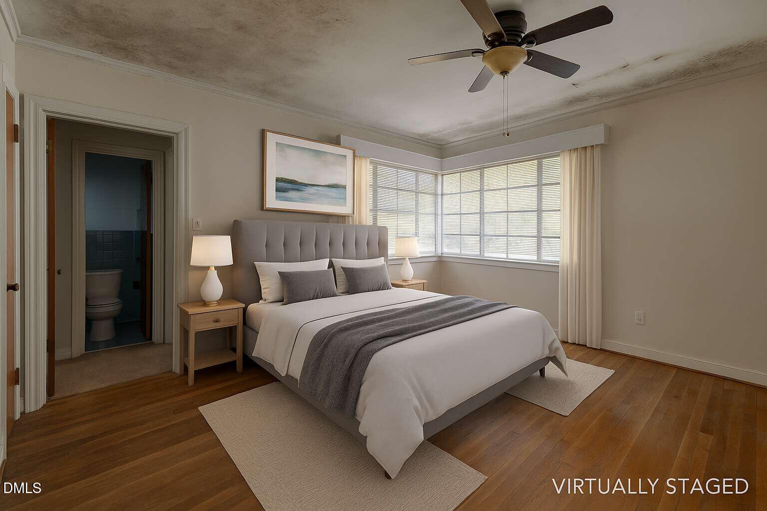 128 Nelson Street Durham, NC 27707 - Photo 17 of 23 a bedroom with a bed and a window