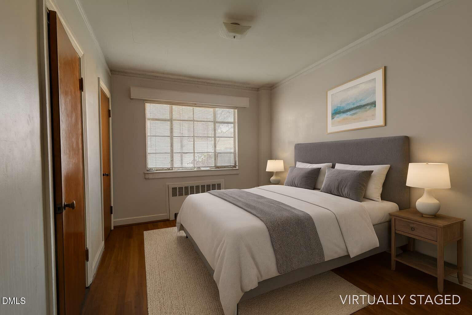 128 Nelson Street Durham, NC 27707 - Photo 20 of 23 a bedroom with a bed and a window