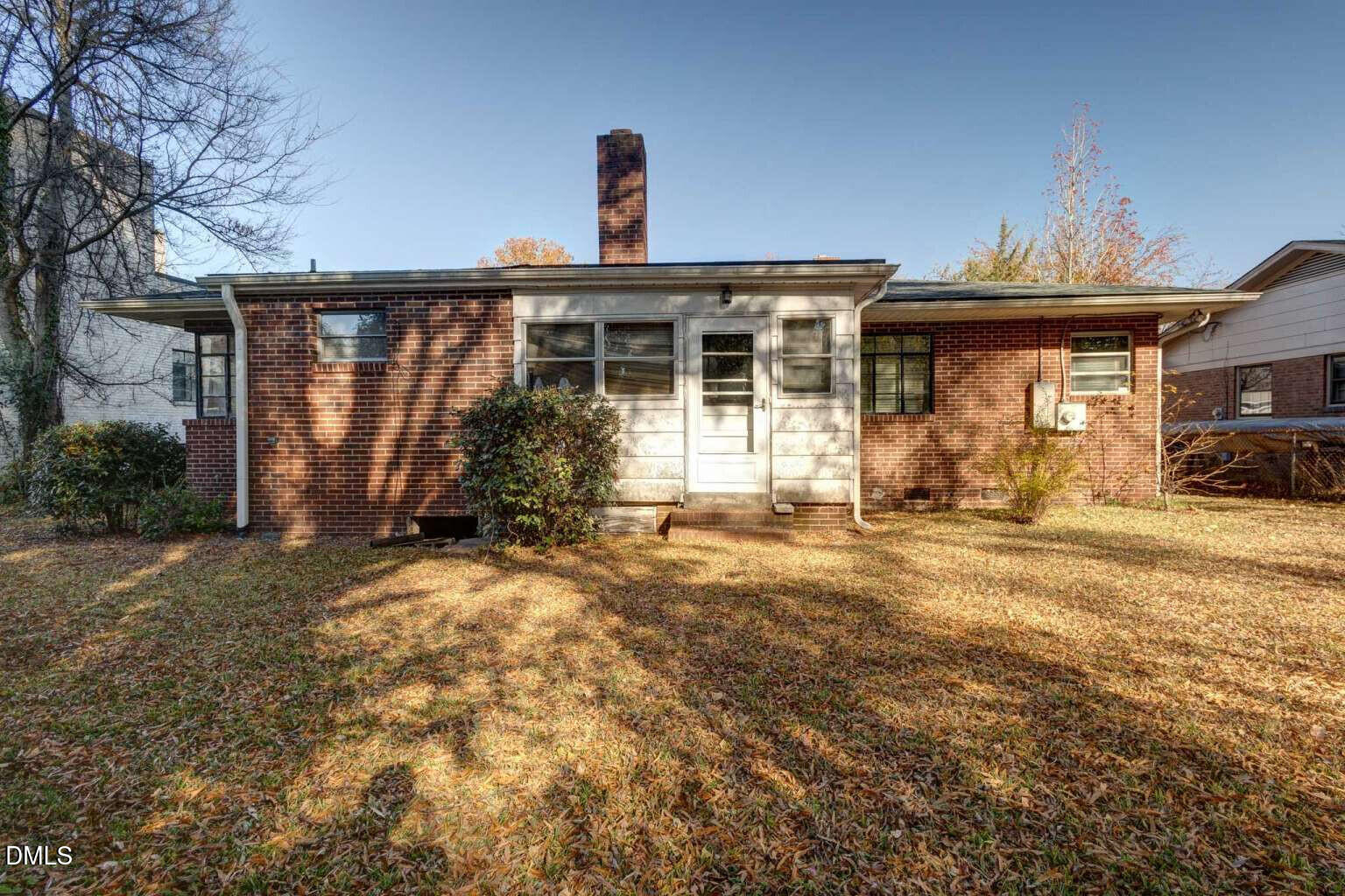 128 Nelson Street Durham, NC 27707 - Photo 22 of 23 a front view of a house with garden