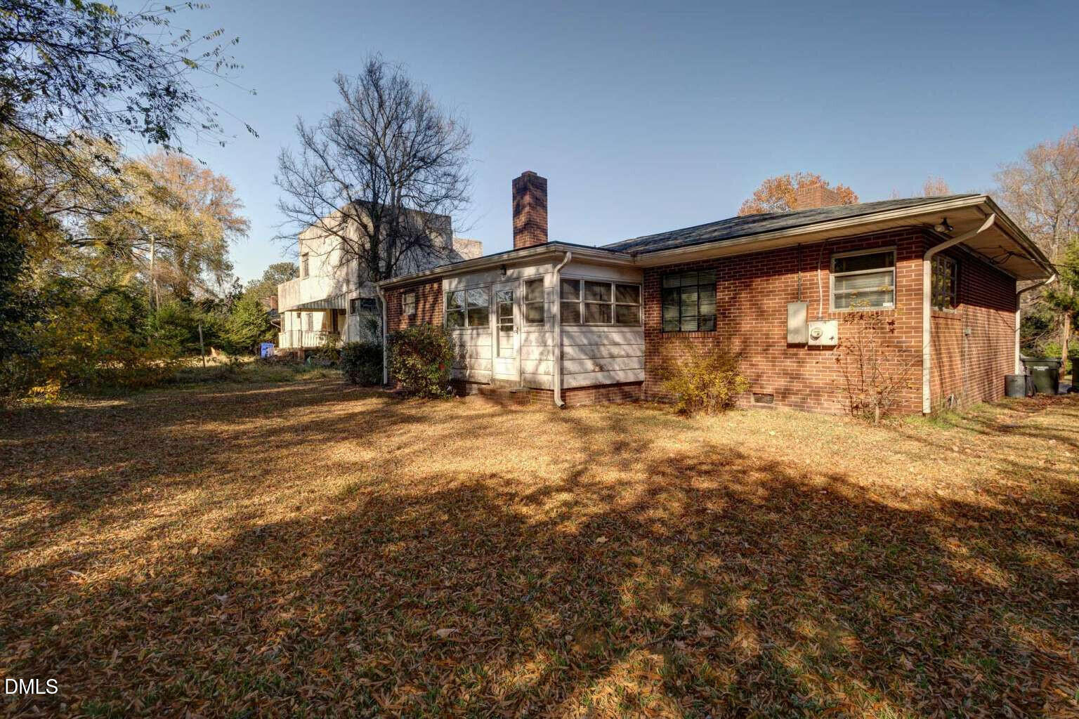 128 Nelson Street Durham, NC 27707 - Photo 23 of 23 a front view of a house with a yard