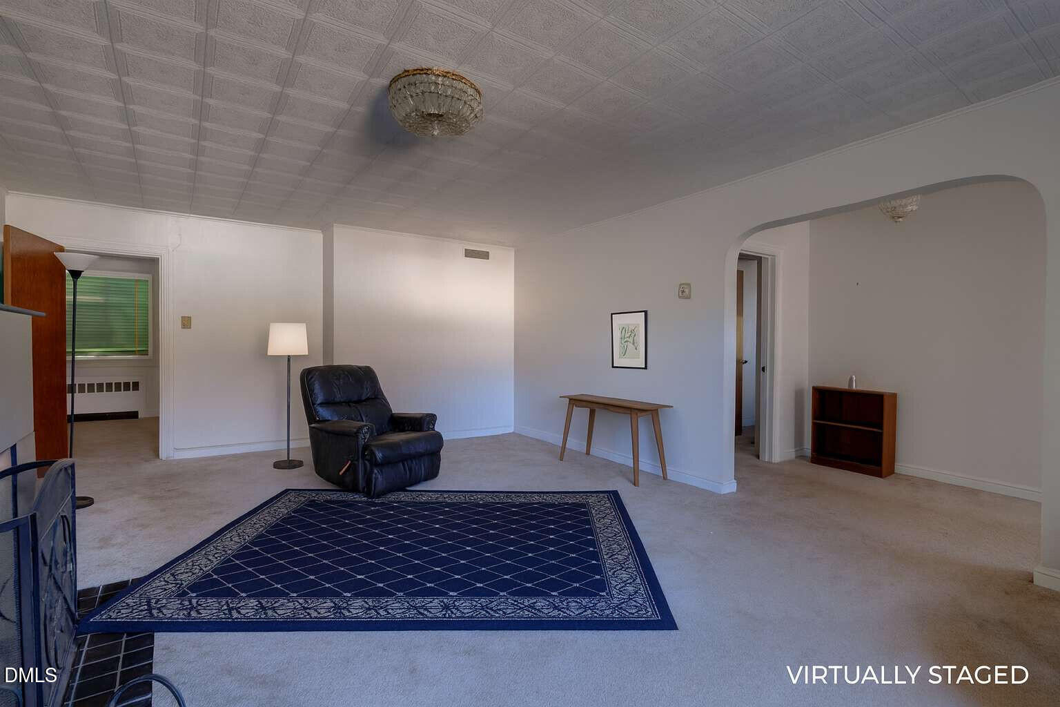 128 Nelson Street Durham, NC 27707 - Photo 6 of 23 a living room with furniture rug and window