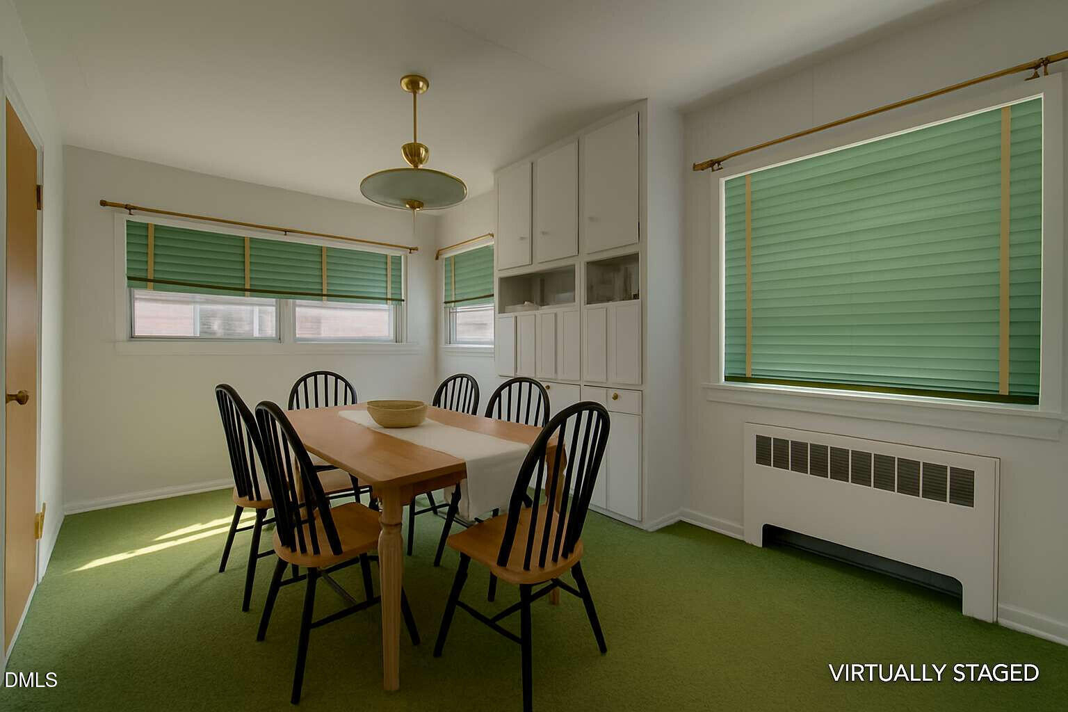 128 Nelson Street Durham, NC 27707 - Photo 7 of 23 a view of a dining room with furniture and window