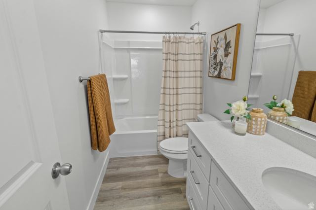 1264 West 500 South, Unit 320 Logan, UT 84321 - Photo 28 of 39 Bathroom featuring a white vanity with a light-colored countertop, an integrated sink, and brushed nickel hardware