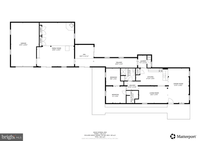 a view of backyard of house with green space