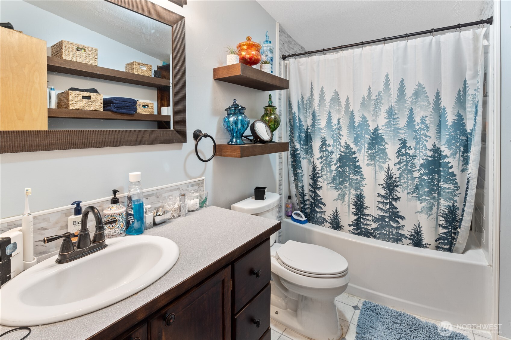 5818 Everson Goshen Road Bellingham, WA 98226 - Photo 13 of 34 a bathroom with a toilet a sink and a mirror