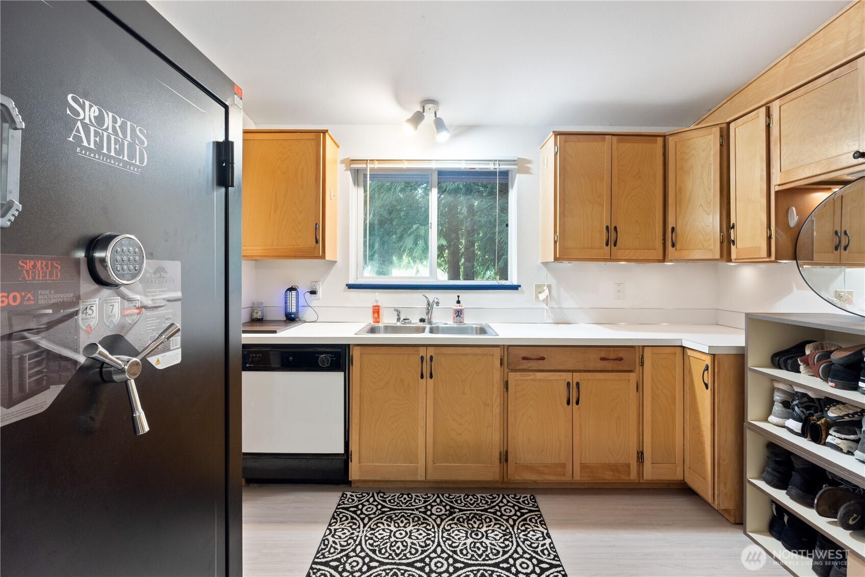 5818 Everson Goshen Road Bellingham, WA 98226 - Photo 18 of 34 a kitchen with a sink cabinets and window