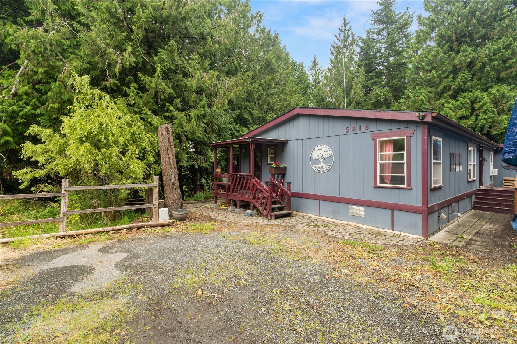 5818 Everson Goshen Road Bellingham, WA 98226 - Photo 2 of 34 a view of a house with a patio and backyard