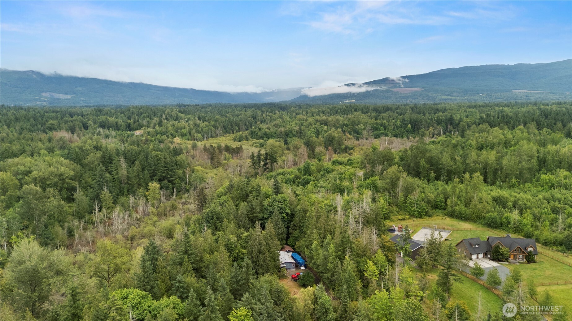 5818 Everson Goshen Road Bellingham, WA 98226 - Photo 30 of 34 a view of a lush green hillside and a mountain