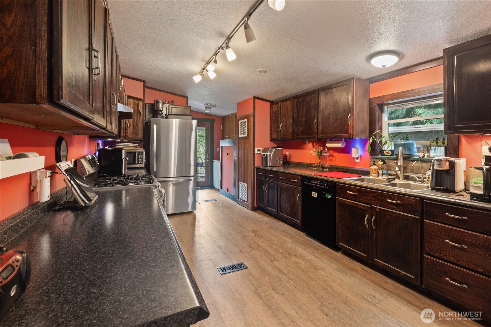 5818 Everson Goshen Road Bellingham, WA 98226 - Photo 4 of 34 a large kitchen with stainless steel appliances lots of counter space and a sink