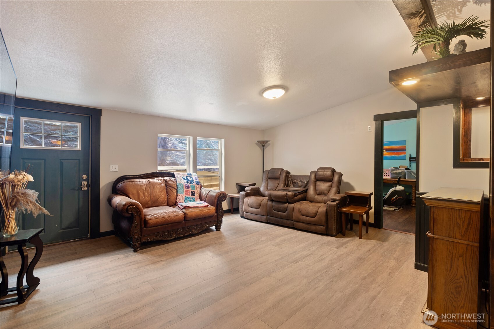 5818 Everson Goshen Road Bellingham, WA 98226 - Photo 8 of 34 a living room with furniture a rug and a large window