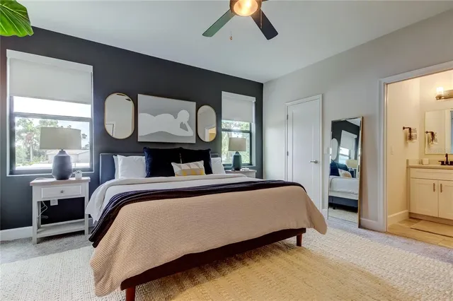 a bed room with a bed and window