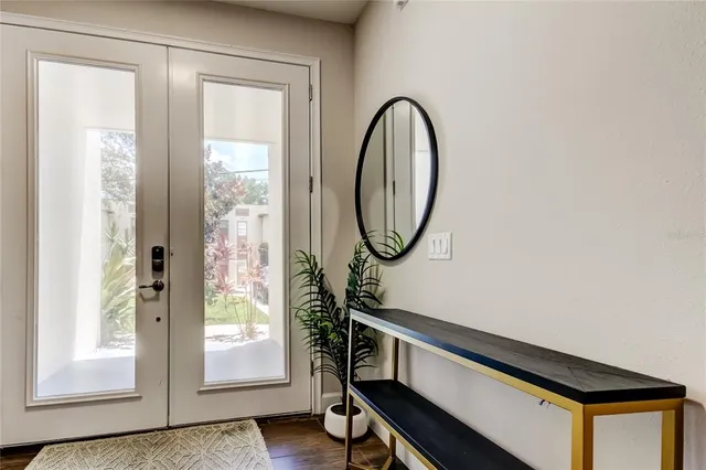 a view of a hallway with windows