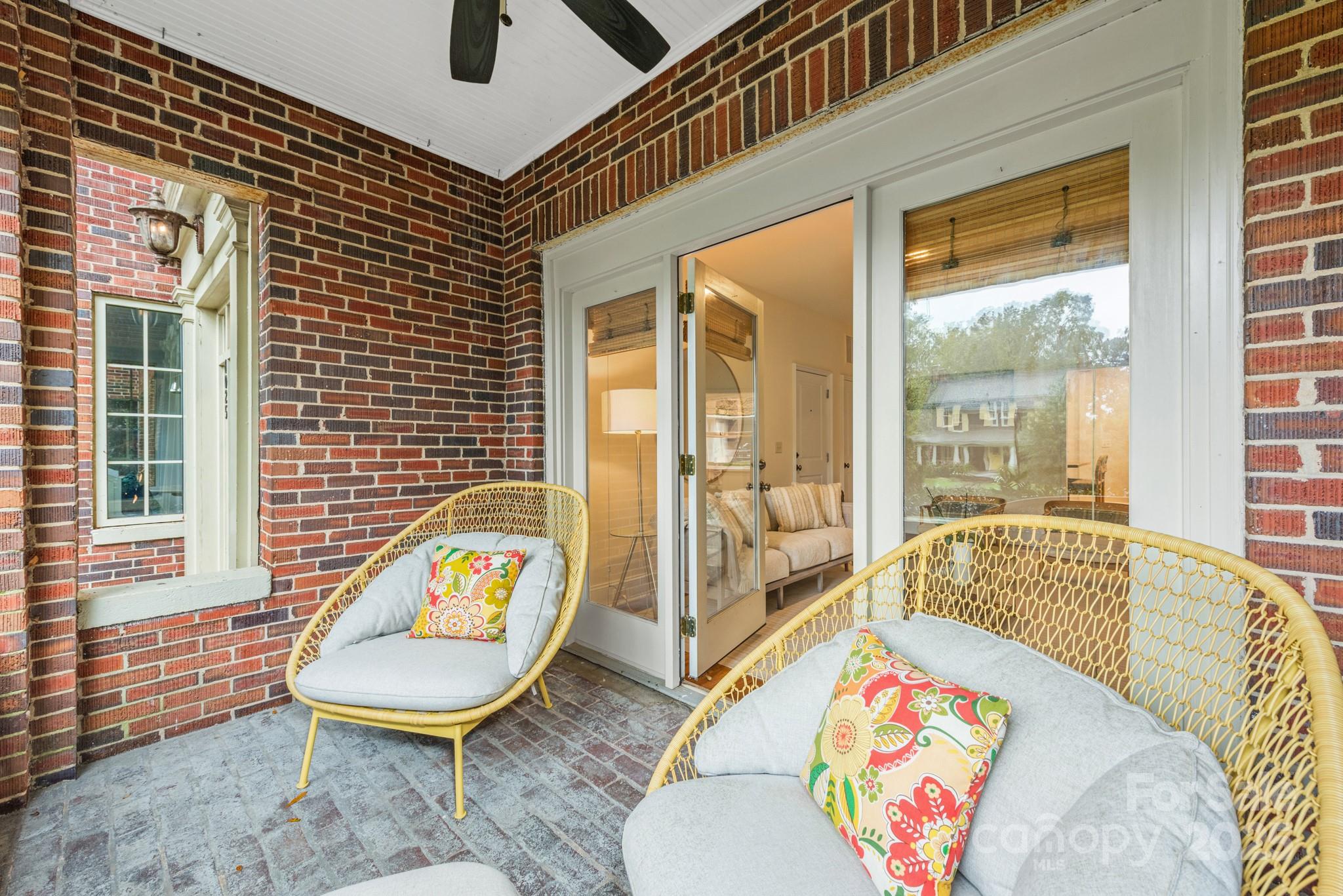 1025 Ardsley Road, Unit 104 Charlotte, NC 28207 - Photo 18 of 30 a outdoor living space with furniture and a window
