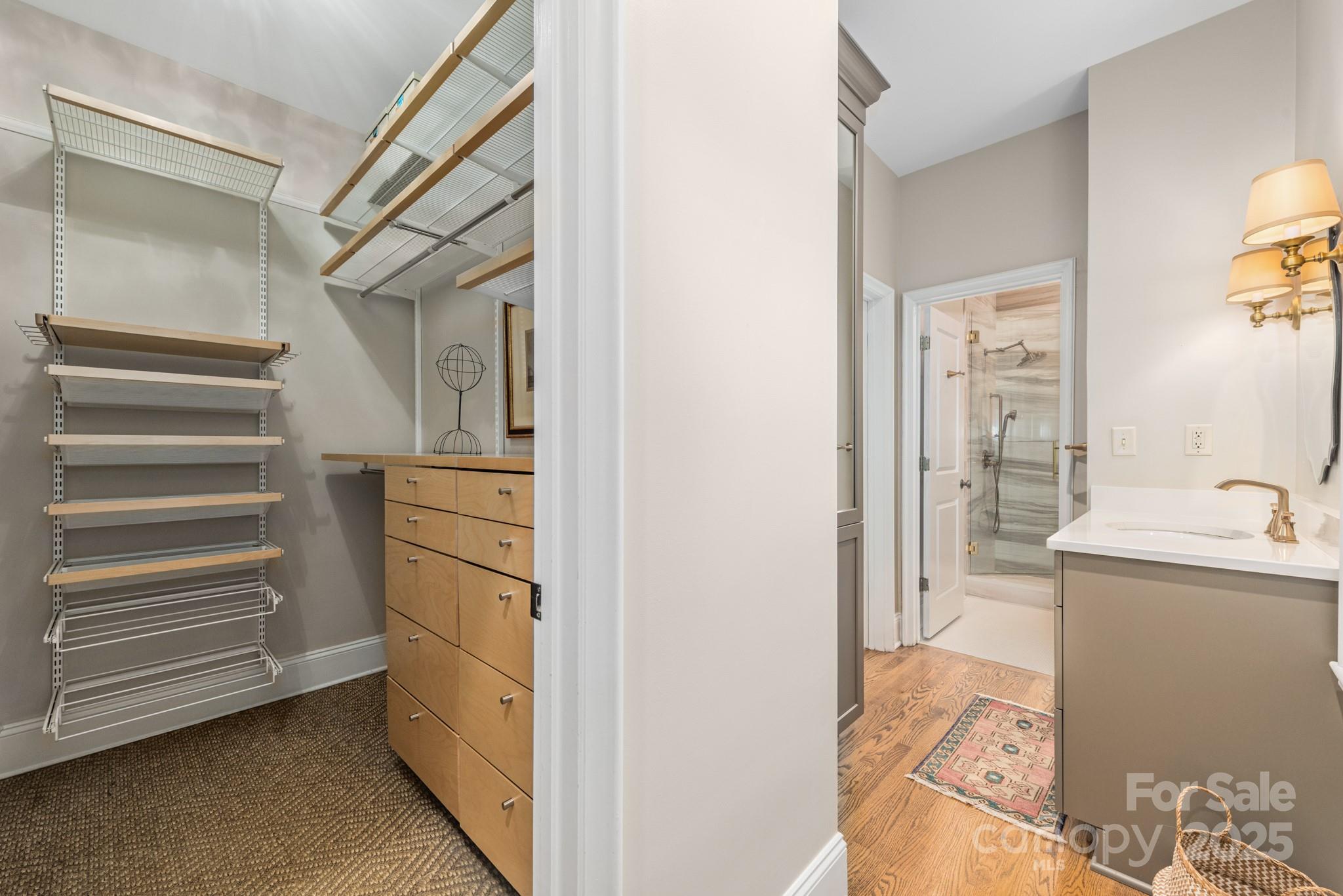 1025 Ardsley Road, Unit 104 Charlotte, NC 28207 - Photo 22 of 30 a kitchen with a refrigerator and a sink
